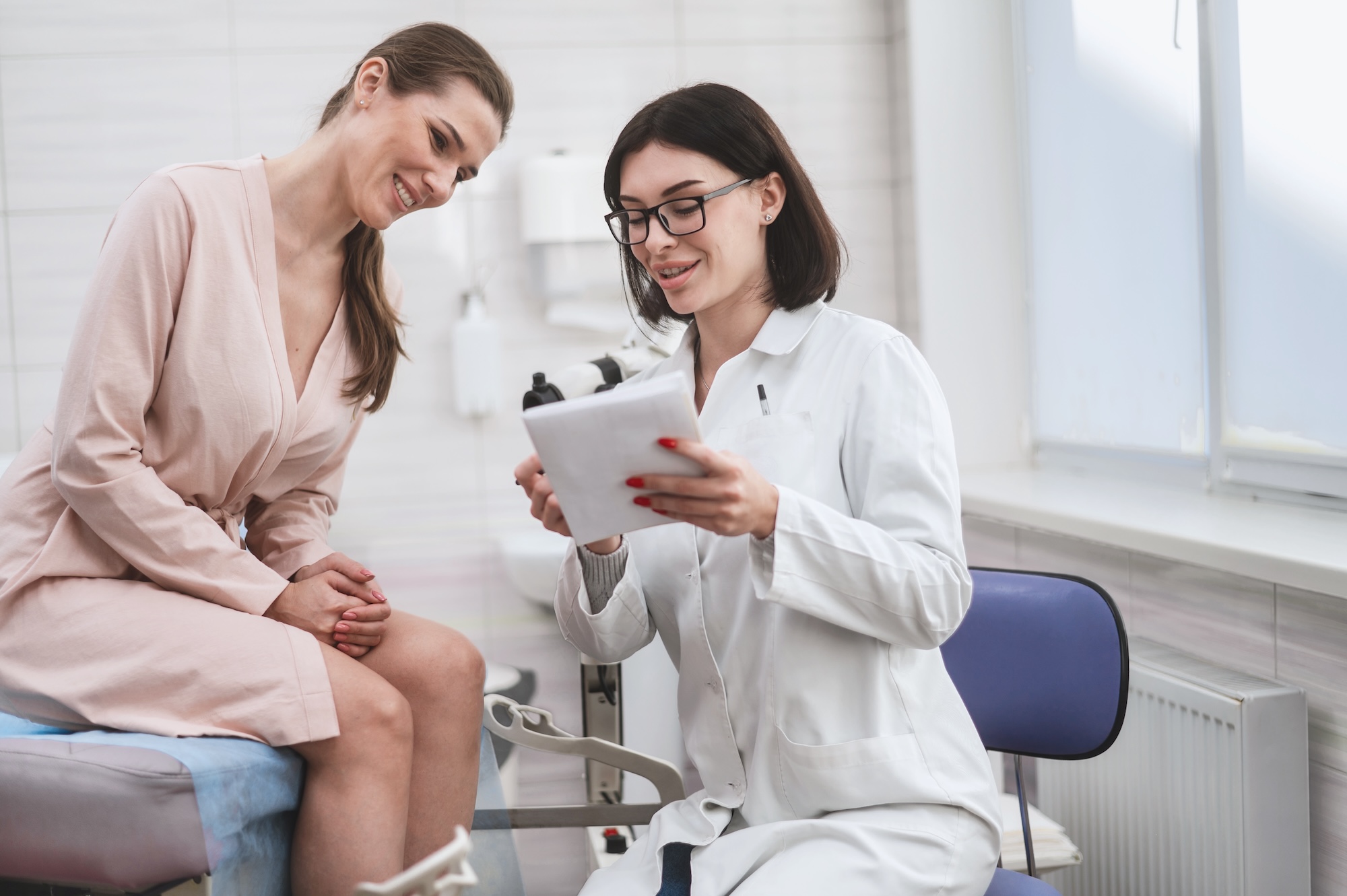 Woman,Doctor,Look,Microscope,At,Gynecologist’s,Appointment.,Female,Gynecologist,Examining